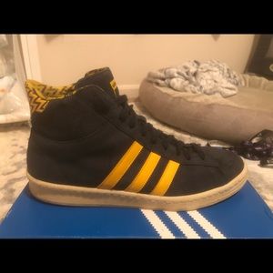 Size 12.5 navy and yellow adidas hightops (SOLD)